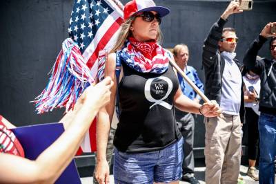What Makes People Fall for QAnon?