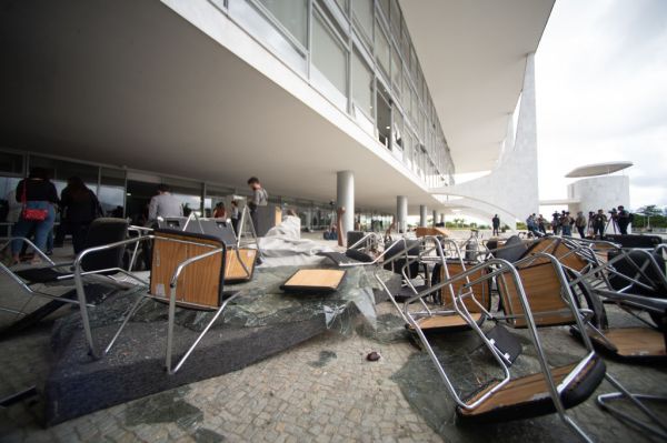 BRASILIA, BRAZIL - JANUARY 09: Workers clear debris following the riots. (Photo by Andressa Anholete...