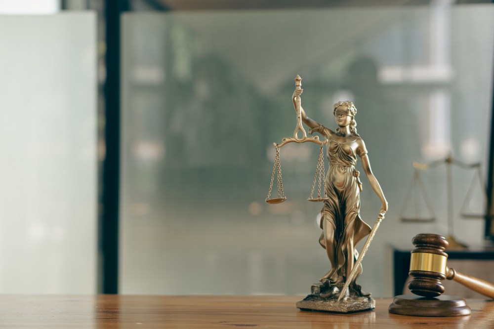 sculpture justice bronze lady book and hammer Statue of Justice – Female Judge or the legendary Eustitia. symbol of justice