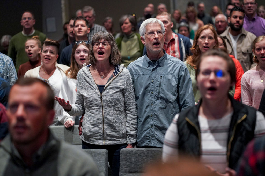 MIDDLETON, WI – APRIL 10: Nancy and Rick Lindroth sing during a