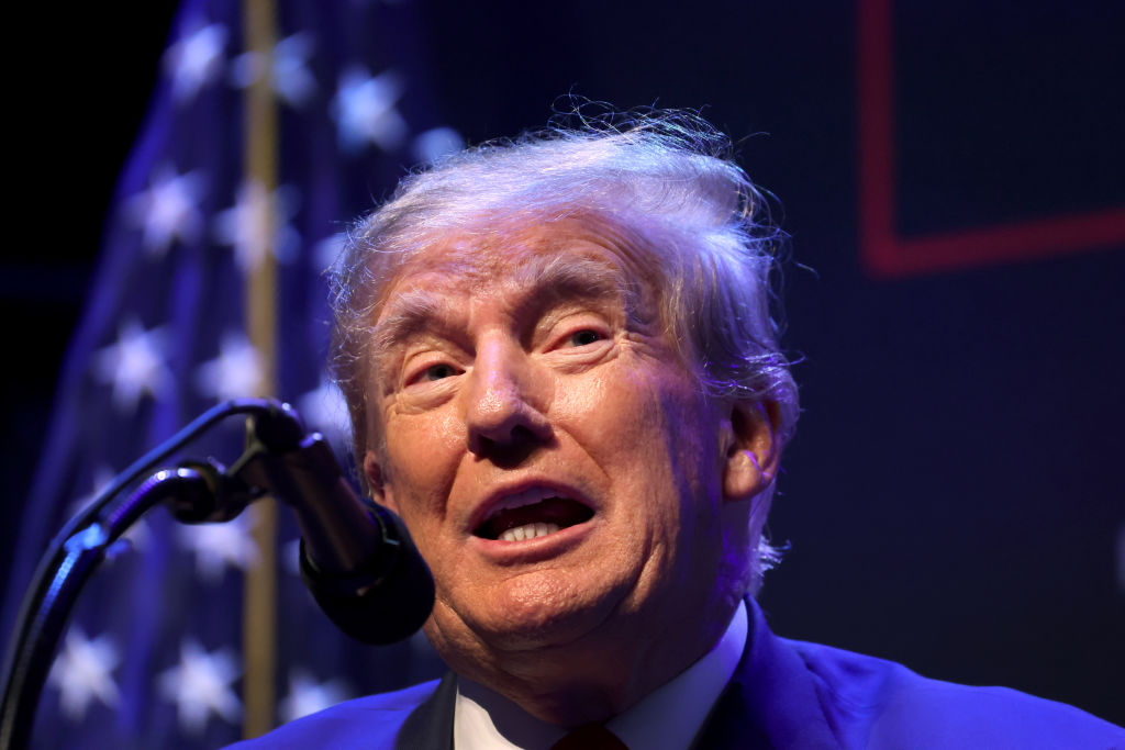 Former President Donald Trump speaks to guests gathered for an event in Davenport, Iowa. (Photo by Scott Olson/Getty Images)