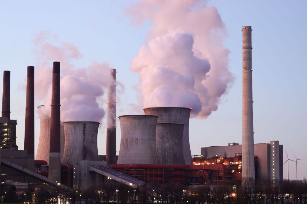 Cooling towers of the Neurath coal-fired power plants on February 08, 2023, in Neurath, Germany. Germany restarted coal plants after Russia invaded Ukraine but is phasing out its nuclear power plants. (Photo by Andreas Rentz/Getty Images)