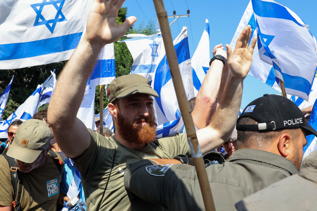 Demonstrators in Tel Aviv protest Netanyahu's judicial reform proposals. (Photo by JACK GUEZ / AFP) (Photo by JACK GUEZ/AFP via Getty Images)