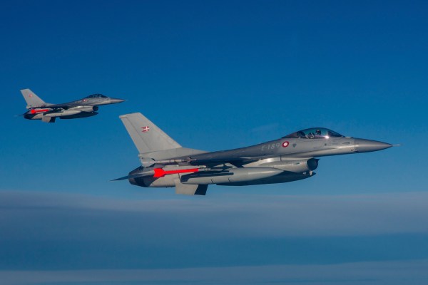 Danish Air Force F-16AM jet with live missiles during an Air Policing mission.