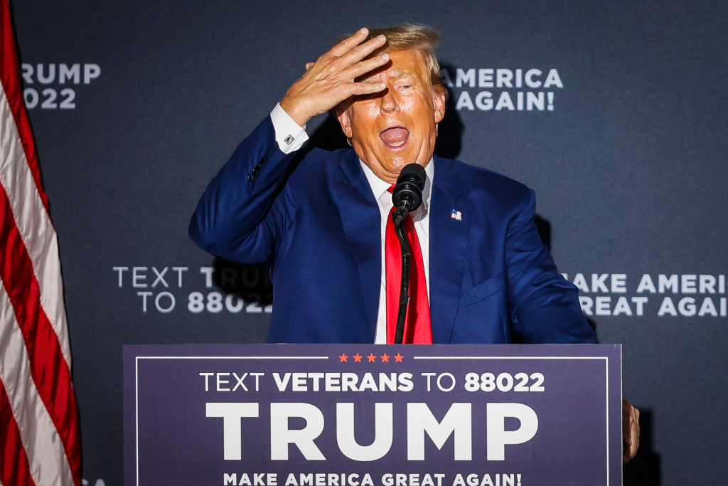 Former President Donald Trump delivers remarks at Windham High School. (Photo by Erin Clark/ Boston Globe/Getty Images)