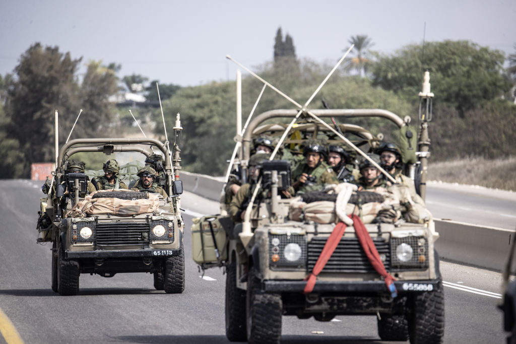 Israeli forces transport military equipment, armored vehicles and artillery to the Gaza border in Israel as Israeli airstrikes continue on October 10, 2023. (Photo by Mostafa Alkharouf/Anadolu via Getty Images)