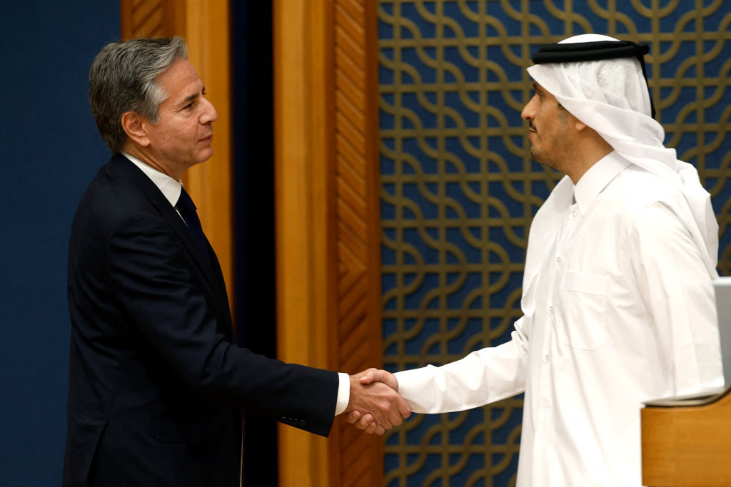 U.S. Secretary of State Antony Blinken shakes hands with Qatar's Prime Minister and Foreign Minister Mohammed bin Abdulrahman Al Thani following their meeting and press conference in Doha on October 13, 2023. (Photo by KARIM JAAFAR / AFP) (Photo by KARIM JAAFAR/AFP via Getty Images)