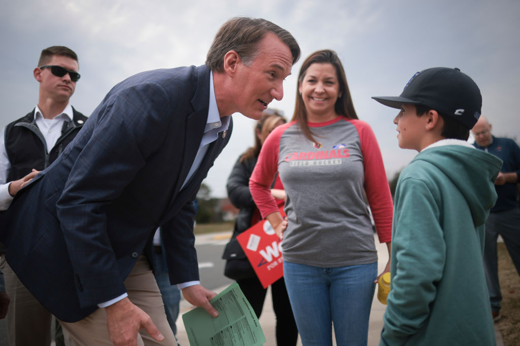 Virginia Gov. Glenn Youngkin greets voters and their children while campaigning at Piney Branch Elementary School November 7, 2023, in Bristow, Virginia. (Photo by Win McNamee/Getty Images)
