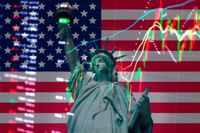 Statue of Liberty on the background of stock charts. Financial system in USA