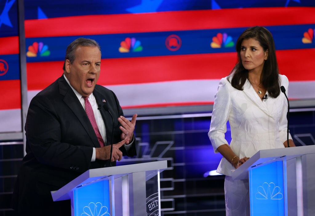 Former New Jersey Gov. Chris Christie speaks alongside former U.N. Ambassador Nikki Haley during the NBC News Republican Presidential Primary Debate on November 8, 2023, in Miami, Florida. (Photo by Joe Raedle/Getty Images)