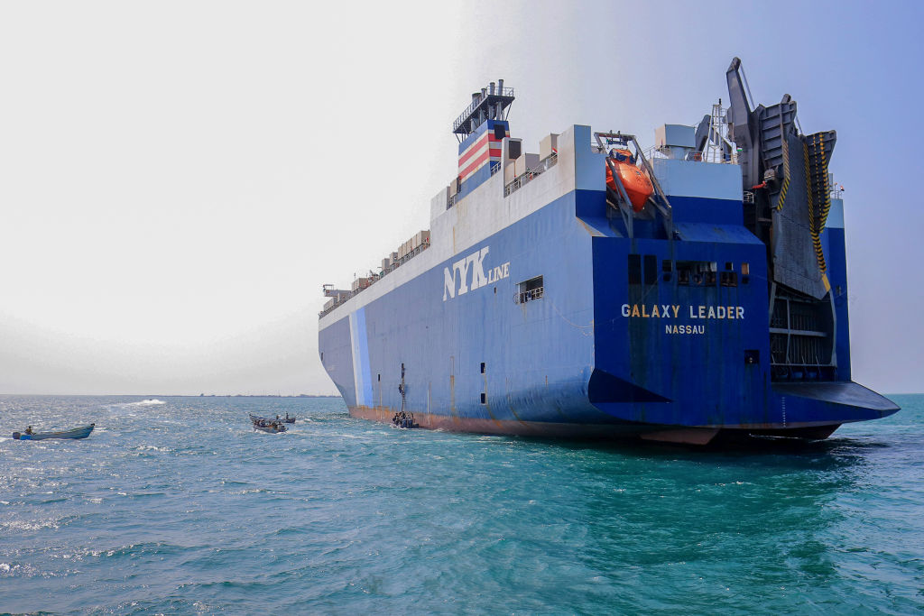 A picture taken during an organized tour by Yemen's Houthi rebels on November 22, 2023 shows the Galaxy Leader cargo ship, seized by Houthi fighters two days earlier, at a port on the Red Sea in Yemen's province of Hodeida. (Photo by AFP via Getty Images)