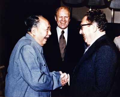 Copy of President Ford Secretary of State Henry Kissinger with Mao Tse-Tung, Chairman of Chinese Communist Party, during a visit to the Chairman’s residence.
