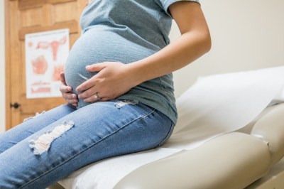 Excited pregnant woman is ready for baby