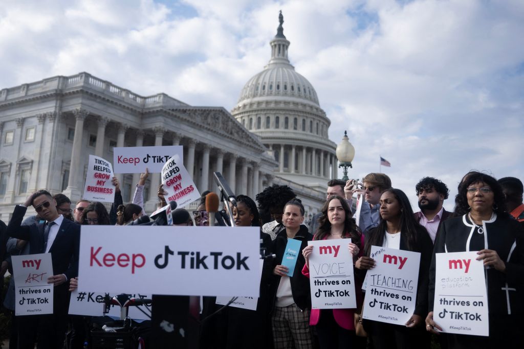 People gather on Capitol Hill in Washington, D.C., on March 22, 2023, for a press conference about their opposition to a TikTok ban being considered by lawmakers. (Photo by BRENDAN SMIALOWSKI/AFP via Getty Images)