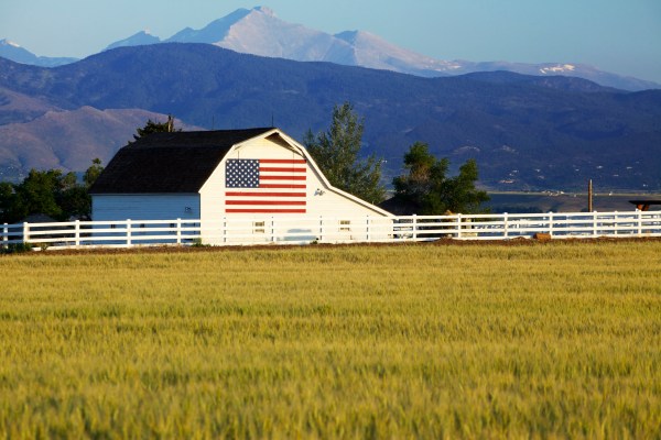 American Flag on Barn in Rocky Mountains
