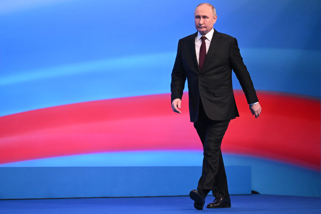 Russian President Vladimir Putin meets with the media at his campaign headquarters in Moscow on March 18, 2024. (Photo by NATALIA KOLESNIKOVA/POOL/AFP via Getty Images)