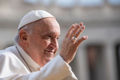 Pope Francis waves as he arrives in St. Peter’s Square for