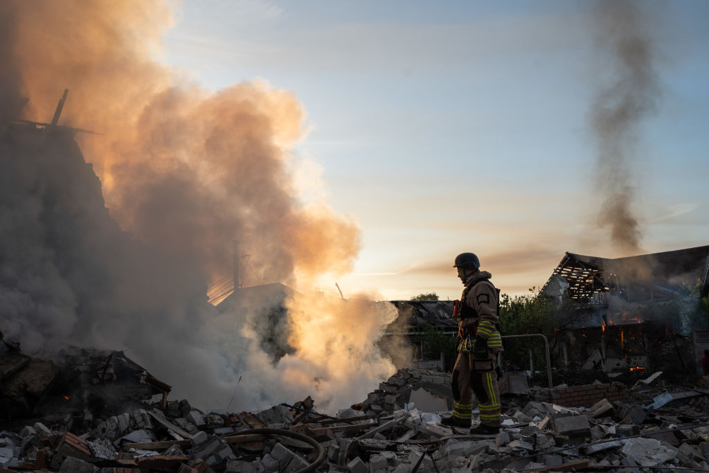 Rescuers extinguish a fire in Kharkiv, Ukraine, on May 10, 2024, after a Russian missile strike on residential buildings in the area. (Photo by Viacheslav Mavrychev/Suspilne Ukraine/JSC "UA:PBC"/Global Images Ukraine via Getty Images)