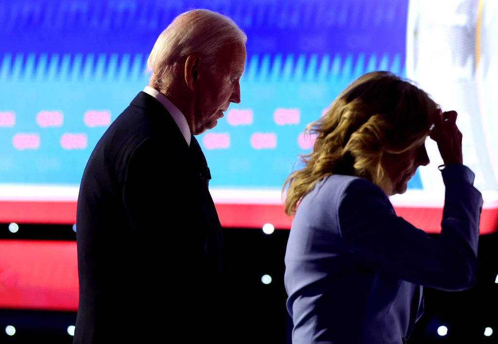 President Joe Biden walks off with first lady Jill Biden following the presidential debate at the CNN studios on June 27, 2024, in Atlanta, Georgia. (Photo by Justin Sullivan/Getty Images)