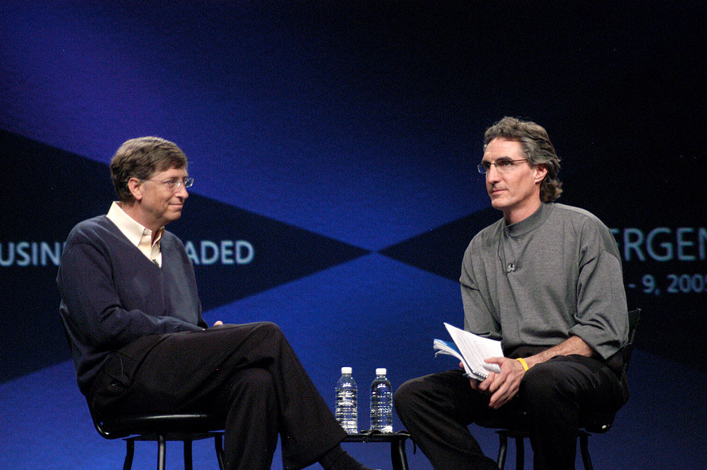 Then-Microsoft Chairman Bill Gates talks with Doug Burgum, the senior vice president responsible for the Microsoft Business Solutions group, in 2005 at the San Diego Convention Center. (Photo by R. Born/WireImage)