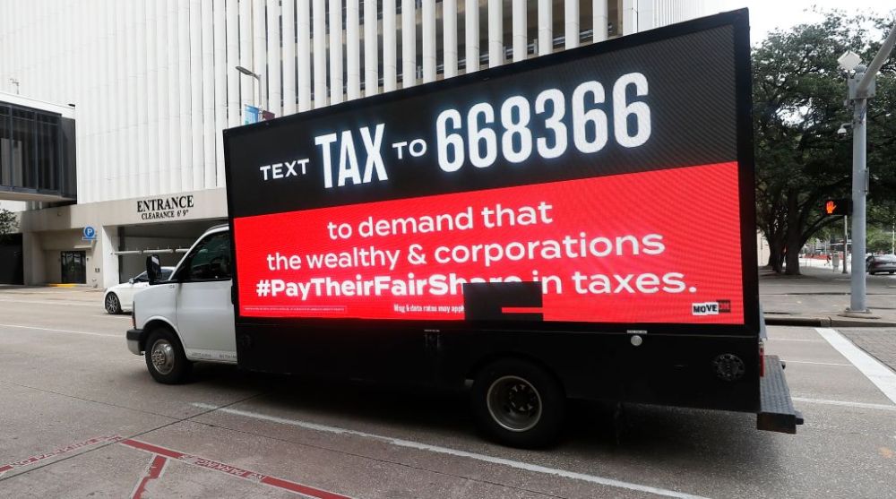 #TaxTheRich Action With Billboard Truck At Sen. Ted Cruz’s Houston Office