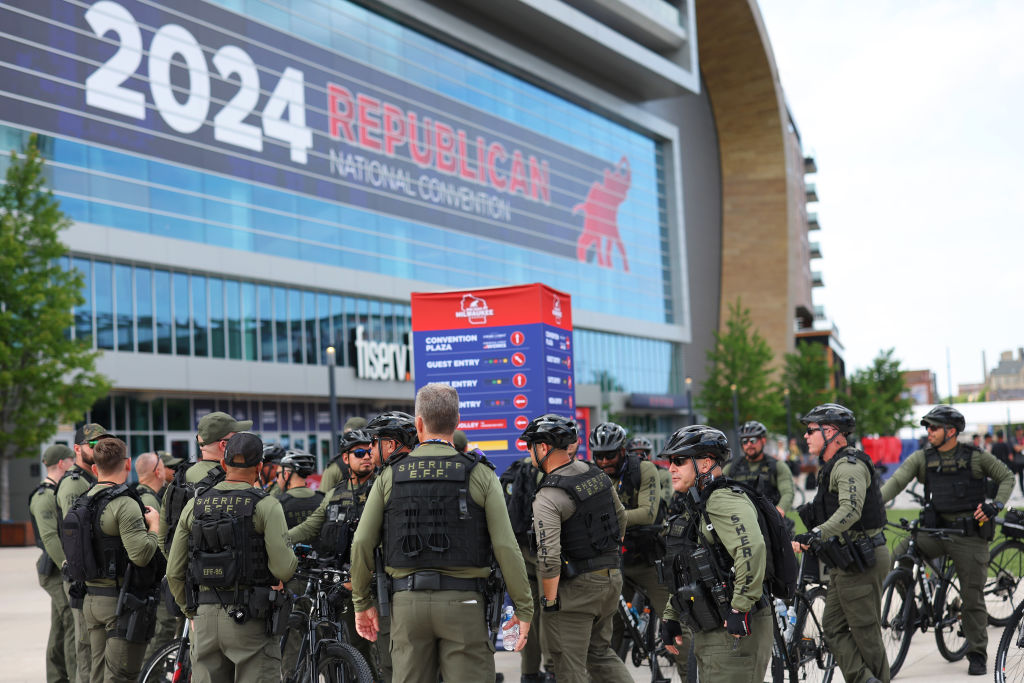 Law enforcement officers hang out in front of the Fiserv Forum Plaza in Milwaukee, Wisconsin, on July 14, 2024, ahead of the 2024 Republican National Convention. (Photo by Michael M. Santiago/Getty Images)