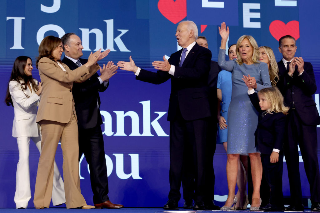 Vice President Kamala Harris and second gentleman Doug Emhoff applaud President Joe Biden on the stage while First Lady Jill Biden during the 2024 Democratic National Convention at United Center in Chicago on Monday, August 19, 2024. (Robert Gauthier/Los Angeles Times via Getty Images)