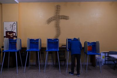 A Voters Fills Out Their Ballot At A Polling Station In Green Bay Wisconsin