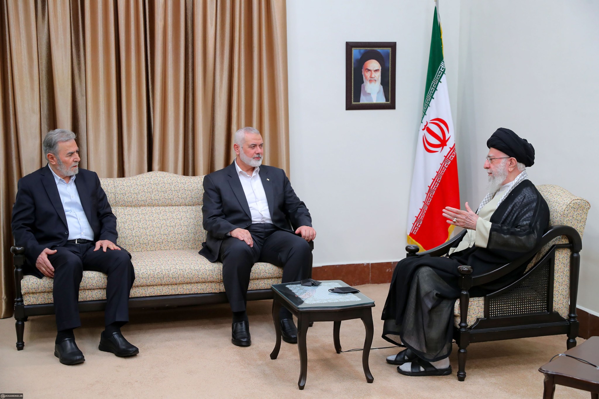 Ali Khamenei, the Supreme Leader of Iran, meets with Ismail Haniyeh, head of the political bureau of Hamas, and Ziyad al-Nakhalah, the Secretary General of the Palestinian Islamic Jihad Movement, in Tehran on July 30, 2024. (Handout photo by the Iranian Supreme Leader's Press Office via Getty Images)