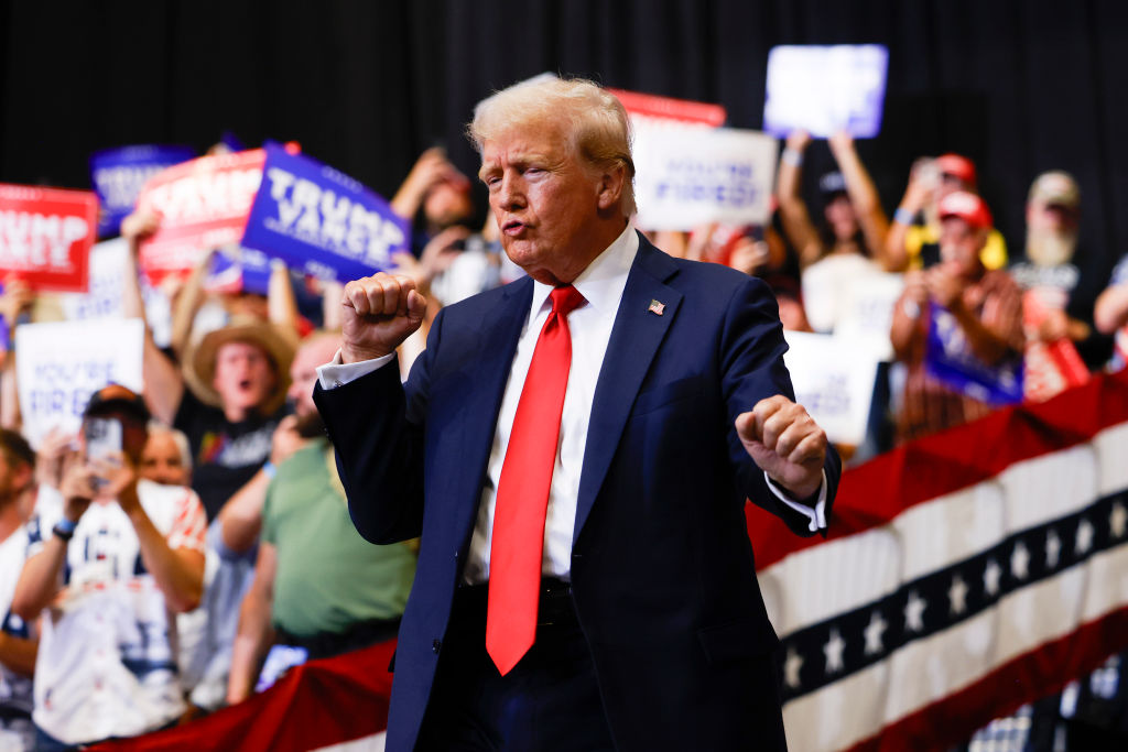 Former President Donald Trump walks toward the stage to speak at a rally at the Brick Breeden Fieldhouse at Montana State University on August 9, 2024, in Bozeman, Montana. (Photo by Michael Ciaglo/Getty Images)