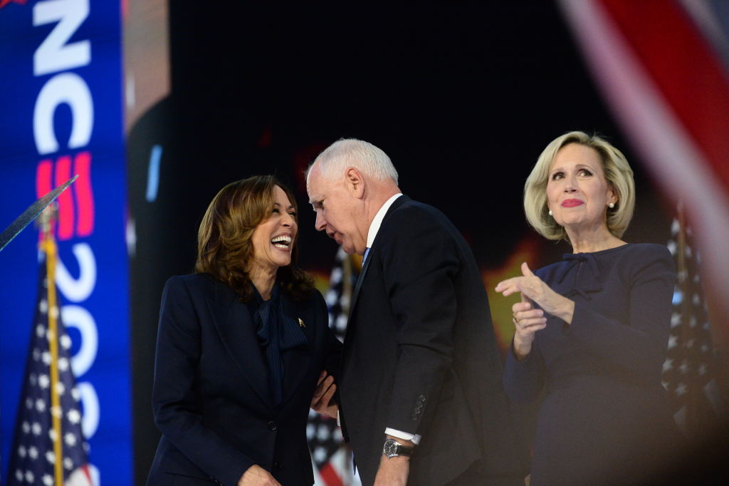 Vice President Kamala Harris, Gov. Tim Walz, and his wife Gwen Walz during the Democratic National Convention in Chicago on August 22, 2024. (Photo by Jacek Boczarski/Anadolu/Getty Images)