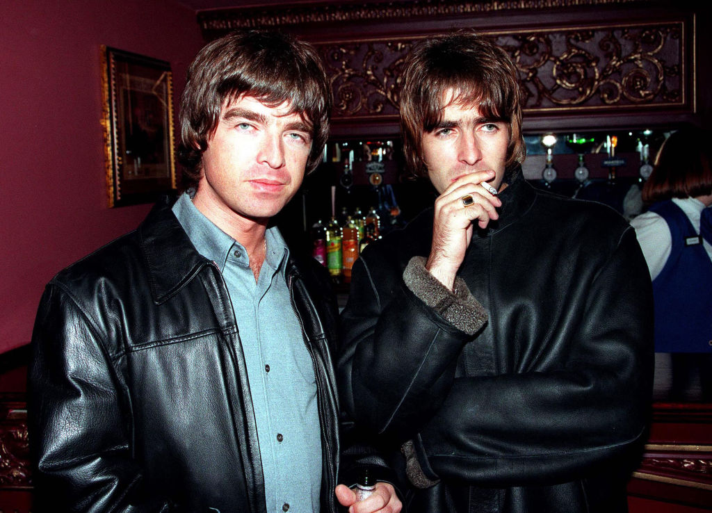 Oasis lead singer Liam Gallagher (right) and brother Noal Gallagher at the opening night of Steve Coogan's comedy show in London's West End in 1995. (Photo by Dave Hogan/Getty Images)