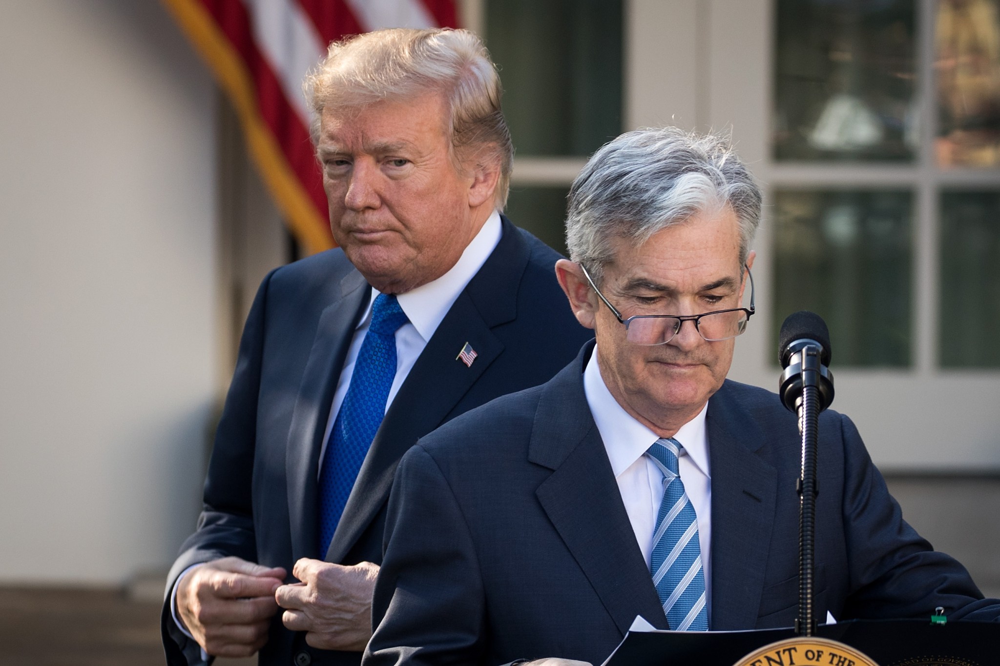 Then-President Donald Trump looks on as his nominee for the chairman of the Federal Reserve Jerome Powell takes to the podium during a press event in the Rose Garden at the White House on November 2, 2017. (Photo by Drew Angerer/Getty Images)