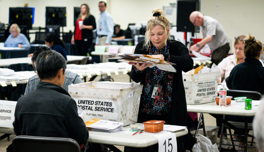 Election workers process mail-in ballots at the Orange County Registrar of Voters facility in Santa Ana, California, on Monday, February 26, 2024. (Photo by Paul Bersebach/MediaNews Group/Orange County Register via Getty Images)