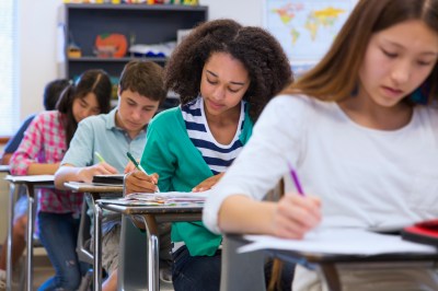 Students taking notes in class