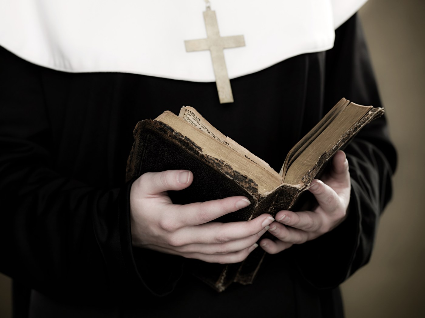 A nun holding a bible