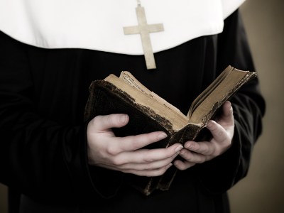 A nun holding a bible