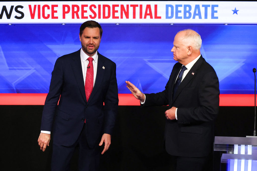 Ohio Sen. J.D. Vance and Minnesota Gov. Tim Walz arrive to participate in the vice presidential debate hosted by CBS News in New York City on October 1, 2024. (Photo by CHARLY TRIBALLEAU/AFP via Getty Images)