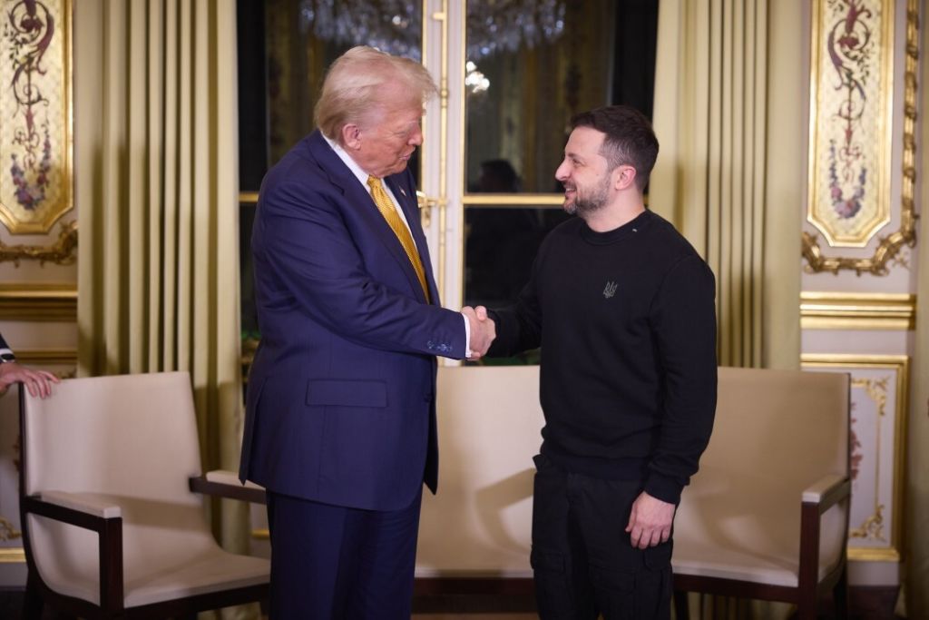 Ukrainian President Volodymyr Zelenskyy and President-elect Donald Trump shake hands after their meeting at the Elysee Presidential Palace in Paris, France on December 7, 2024. (Photo by Ukrainian Presidency / Handout/Anadolu via Getty Images)