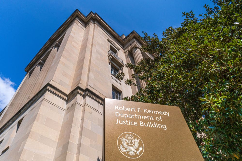 Department of Justice headquarters building. (Photo by J. David Ake/Getty Images)