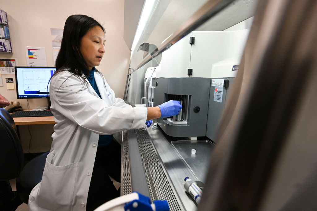 Professor Meera G. Nair uses a fluorescence-activated cell sorter on Tuesday, Feb. 11, 2025, in Riverside, California. (Photo by Anjali Sharif-Paul/MediaNewsGroup/Press-Enterprise/Getty Images)