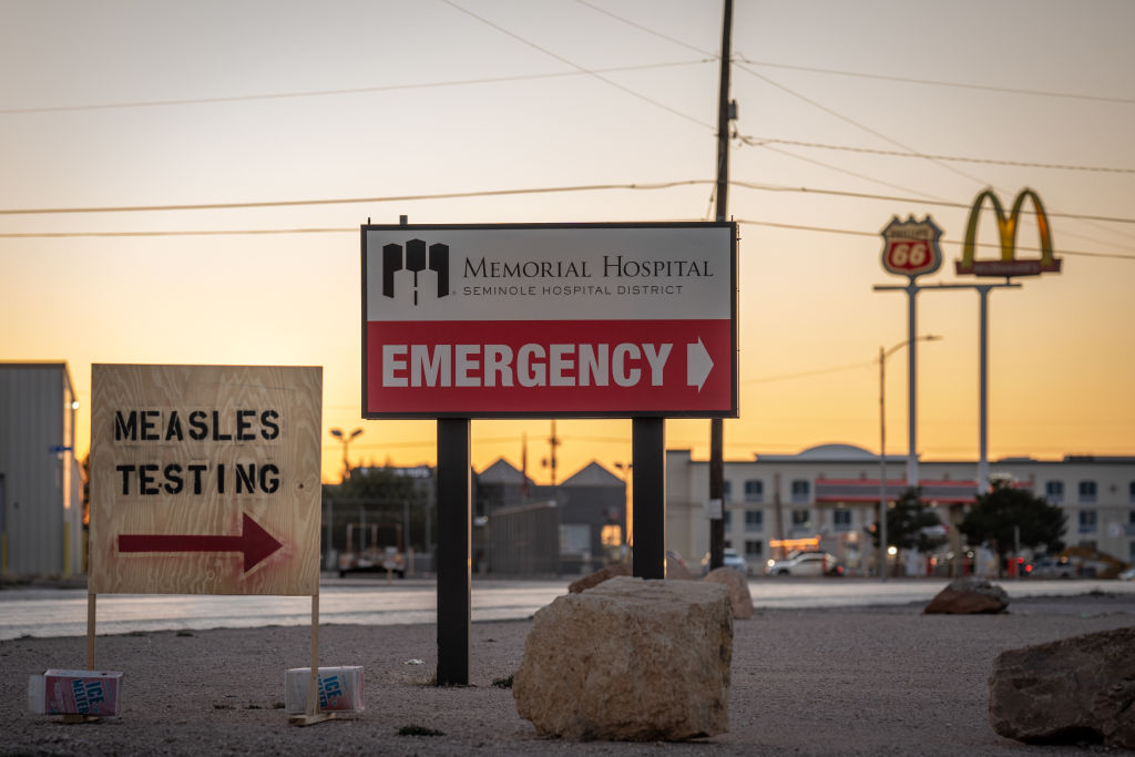 Signs point the way to measles testing on February 27, 2025 in Seminole, Texas. (Photo by Jan Sonnenmair/Getty Images)