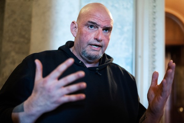 Democratic Sen. John Fetterman of Pennsylvania talks with reporters after a Senate luncheons in the U.S. Capitol on March 11, 2025. (Tom Williams/CQ-Roll Call, Inc via Getty Images)