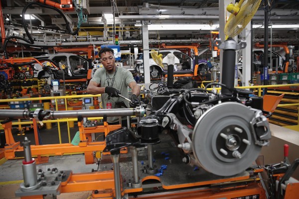 Workers assemble Ford vehicles at the Chicago Assembly Plant on June 24, 2019. (Photo by Scott Olson/Getty Images)