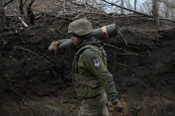 An artilleryman of the 155th Separate Mechanized Brigade of Ukrainian Armed Forces prepares to fire a self-propelled howitzer toward Russian positions at an undisclosed location in the Donetsk Region on January 6, 2025, amid the Russian invasion of Ukraine. (Photo by Genya Savilov/AFP/Getty Images)
