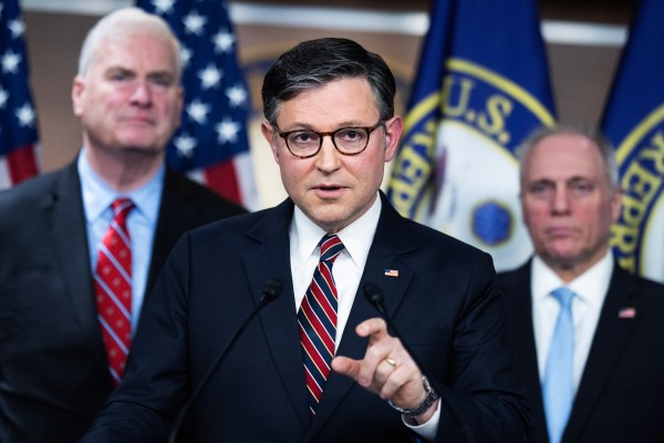 House Speaker Mike Johnson speaks after a meeting of the House Republican Conference in the Capitol on Tuesday, April 8, 2025, as Majority Whip Tom Emmer and Majority Leader Steve Scalise look on. (Tom Williams/CQ-Roll Call Inc. via Getty Images)