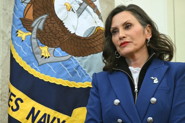 Michigan Gov. Gretchen Whitmer looks on as President Donald Trump signs an executive order in the Oval Office of the White House on April 9, 2025, in Washington, D.C. (Photo by Saul Loeb/AFP/Getty Images)