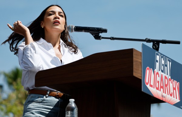 Rep. Alexandria Ocasio-Cortez speaks during a stop on the
