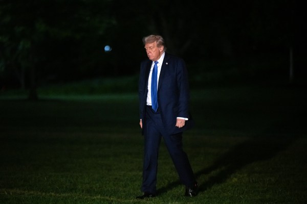 President Donald Trump walks from Marine One after arriving on the South Lawn of the White House in Washington, D.C., on April 24, 2025. (Photo by SAUL LOEB/AFP via Getty Images)