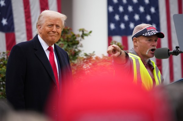 President Donald Trump reacts as a United Auto Worker member speaks during a “Liberation Day” trade announcement event in the Rose Garden at the White House on April 2, 2025, in Washington, D.C. (Photo by Andrew Harnik/Getty Images)
